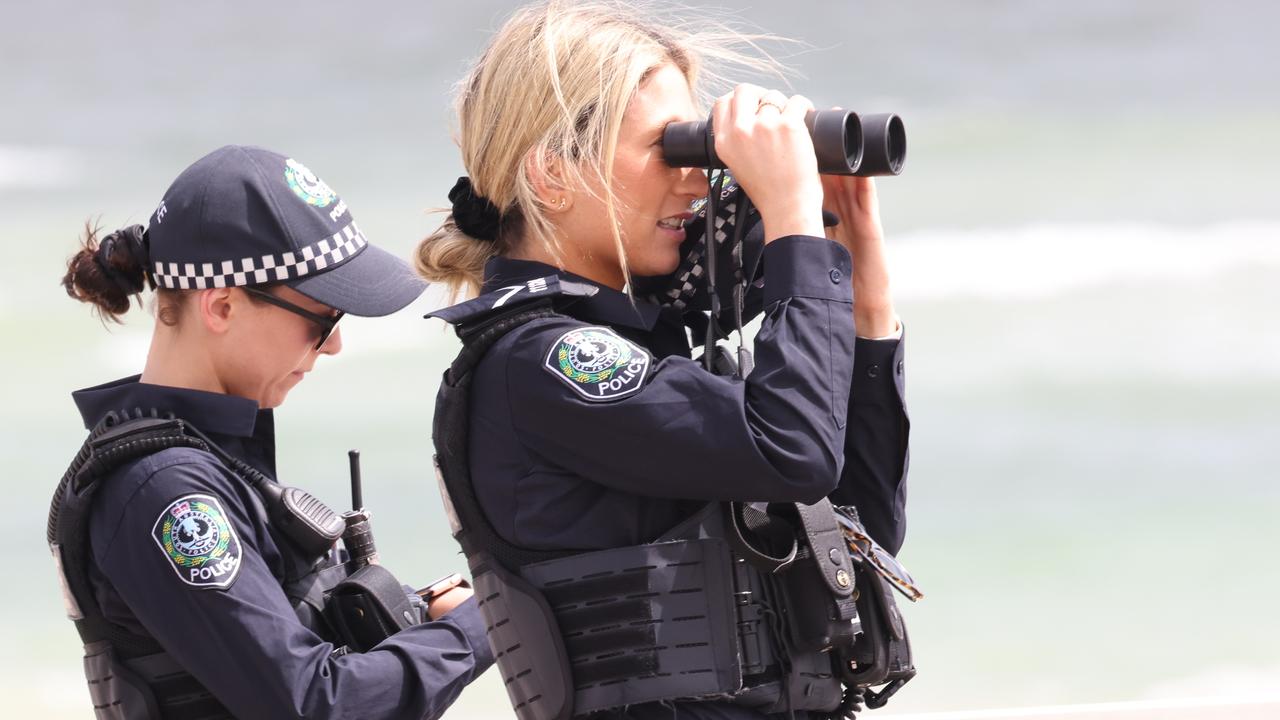 Police search the water off Henley Beach for the missing swimmer Picture: Russell Millard Photography