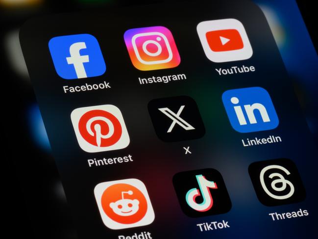 Toronto, Canada - September 24, 2023:  Popular social media apps on an Apple iPhone: Facebook, Instagram, YouTube, Pinterest, X (formerly Twitter), LinkedIn, Reddit, TikTok, and Threads.