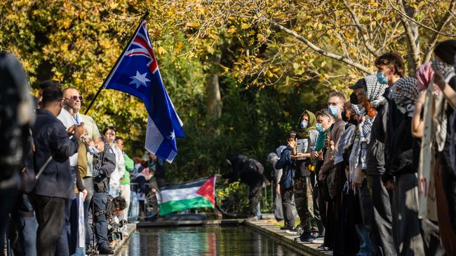Jewish Israel supporters gather in a park near Melbourne University then walk into the university and face off with Pro Palestine protesters. Picture: Jason Edwards