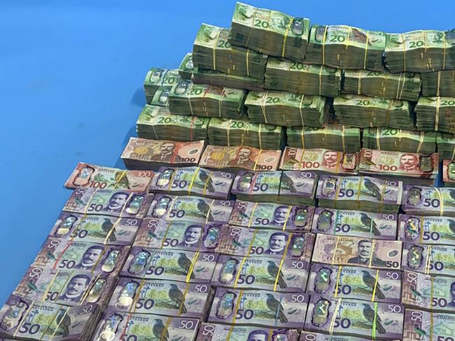 A large amount of cash was seized in raids in New Zealand.