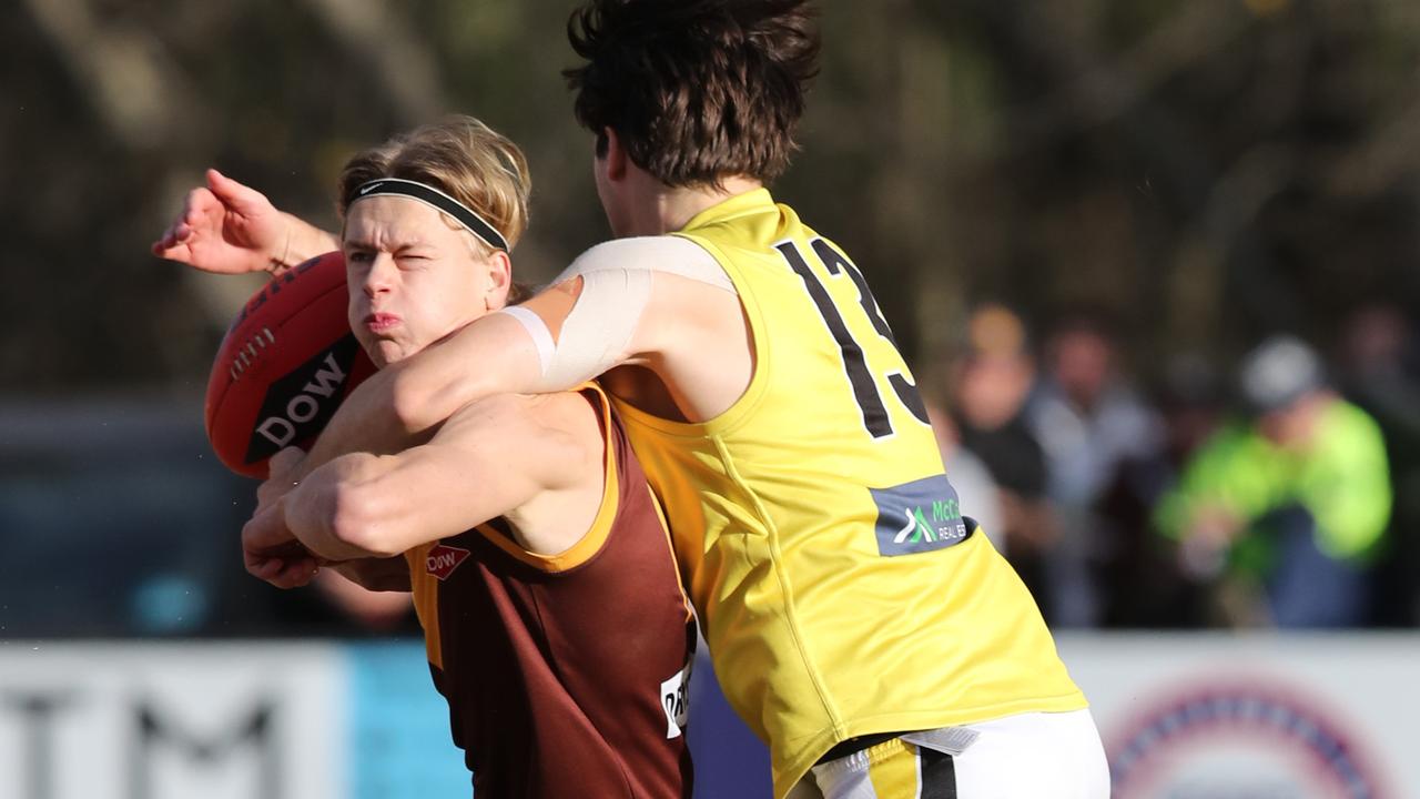 Drysdale's Luke Preece is tackled by Torquay's Clay Page. Picture: Alan Barber