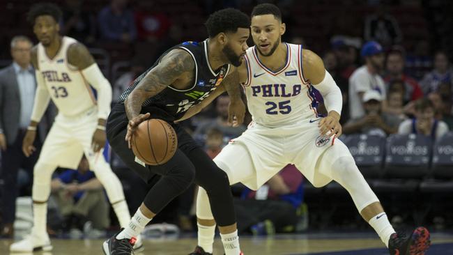 Melbourne United’s DJ Kennedy dribbles the ball against Philadelphia’s Ben Simmons last year. Picture: AFP