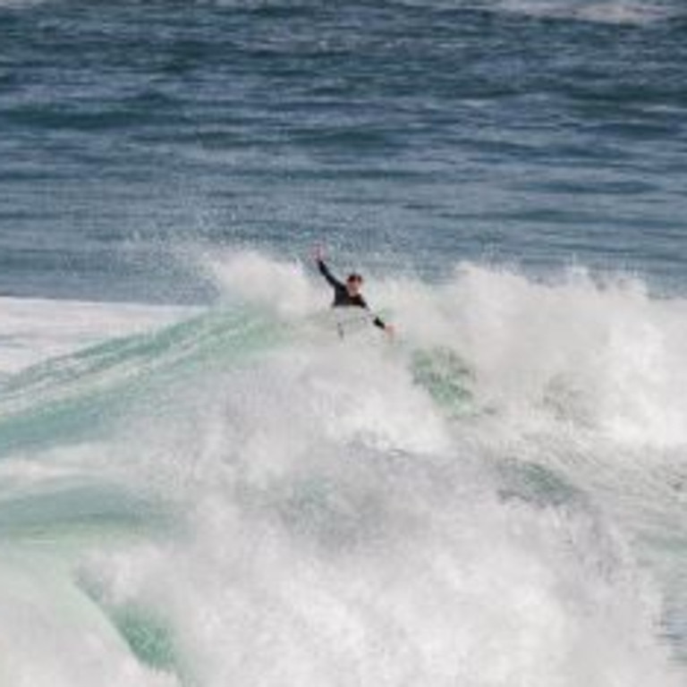 Lachie Doble surfing.