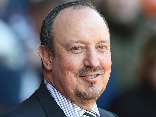 Newcastle United's Spanish manager Rafa Benitez waits for kick off of the English Premier League football match between Liverpool and Newcastle United at Anfield in Liverpool, north west England on April 23, 2016. / AFP PHOTO / PAUL ELLIS / RESTRICTED TO EDITORIAL USE. No use with unauthorized audio, video, data, fixture lists, club/league logos or 'live' services. Online in-match use limited to 75 images, no video emulation. No use in betting, games or single club/league/player publications. /