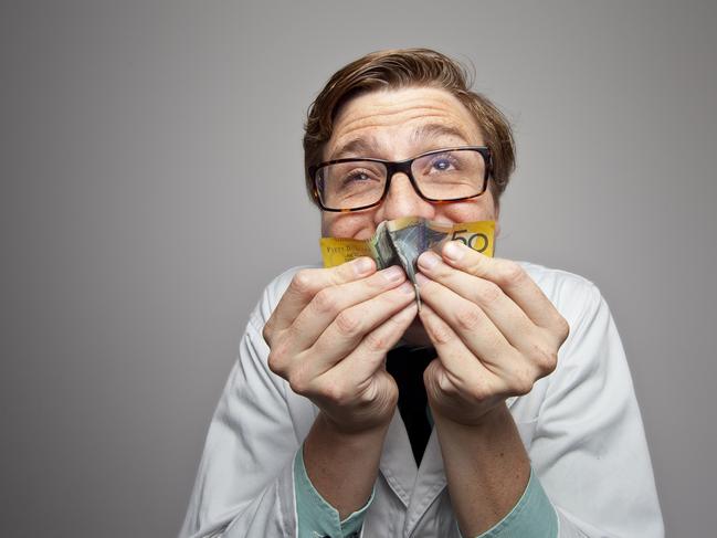 A doctor greedily smells an Australian $50 note. greed money generic