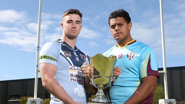 Marymount College’s Charlie Murray and Keebra Park’s Blake Sekona with the Titans Cup. Picture: Glenn Hampson