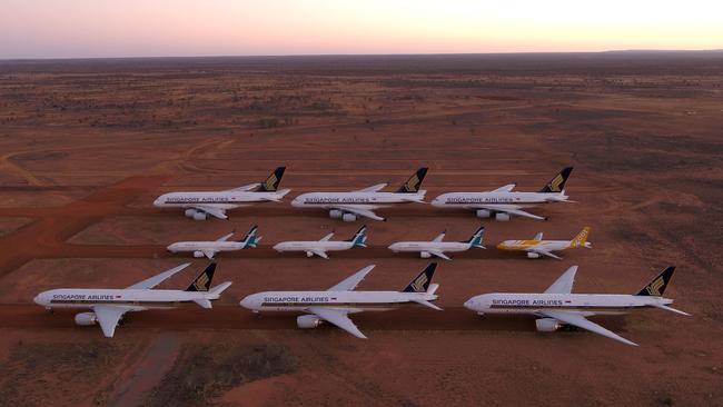 International carriers such as Singapore Airlines have selected Alice Springs Airport as an ideal location to mothball their fleet during the COVID-19 pandemic. Picture: Dan Gerich