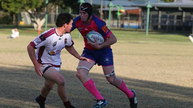 GCDRU (Gold Coast Rugby) first grade clash between Helensvale Hogs (pink) and Nerang Bulls. (white). Kieran van Brecht. Pic Mike Batterham