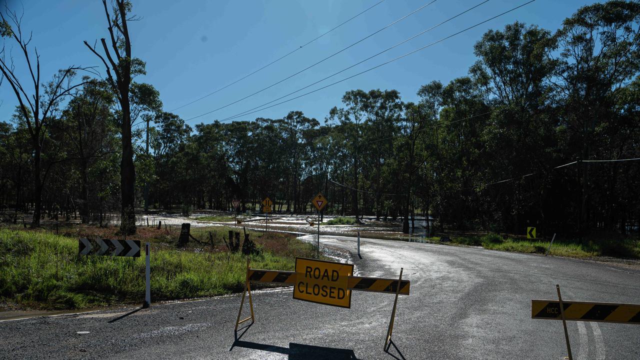 A road submerged under floodwater in Vineyard, Sydney. Picture: NCA NewsWire / Flavio Brancaleone