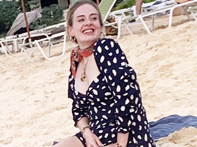 ONE TIME WEB USE ONLY _ FEE APPLIES FOR REUSE - AU_1831119 - ANGUILLA, UNITED KINGDOM  -  BGUK_1831090 -   *PREMIUM-EXCLUSIVE*  - *DO NOT USE UNLESS FEE AGREED* *PICTURES TAKEN ON 02 JAN 2020*British Singer Adele shows off dramatic weight loss while pictured with Harry Styles and Tv presenter James Corden on Holiday together in Anguilla!The superstar singer was seen at Blanchard's beach shack on Meads Bay beach along with her security guard and a large group of friends, the group had lunch together and sang songs until sunset. Adele looked in great spirits as she enjoyed drinks on the beach and showed off her slimmer figure in pattern dress and red Neck scarf!Pictured: AdeleBACKGRID Australia 7 JANUARY 2020 BYLINE MUST READ: JOE BROWN / BACKGRIDPhone: + 61 419 847 429Email:  sarah@backgrid.com.au