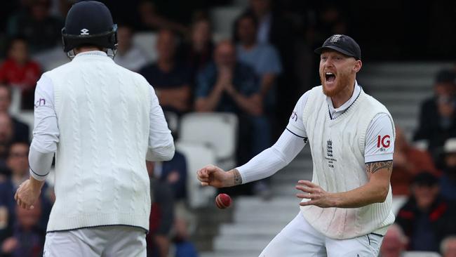 Celebration time. (Photo by Adrian DENNIS / AFP)