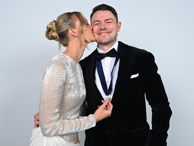 Lachie Neale of the Lions and wife Julie pose for portraits after he was awarded the Brownlow Medal. Picture: Albert Perez/AFL Photos/Getty Images