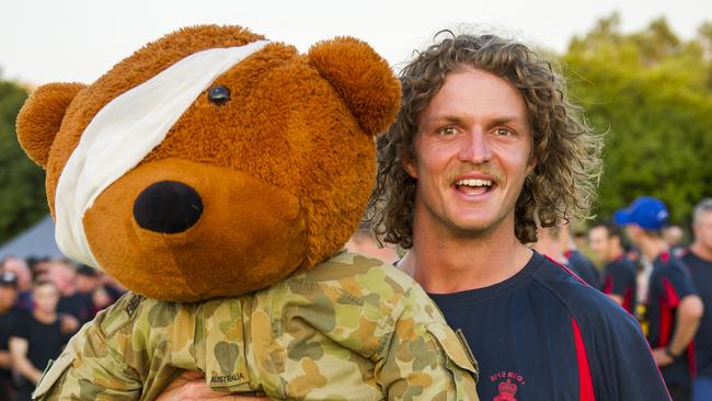 Nick 'The Honey Badger' Cummins pops up in croc country for Darwin army  rugby match