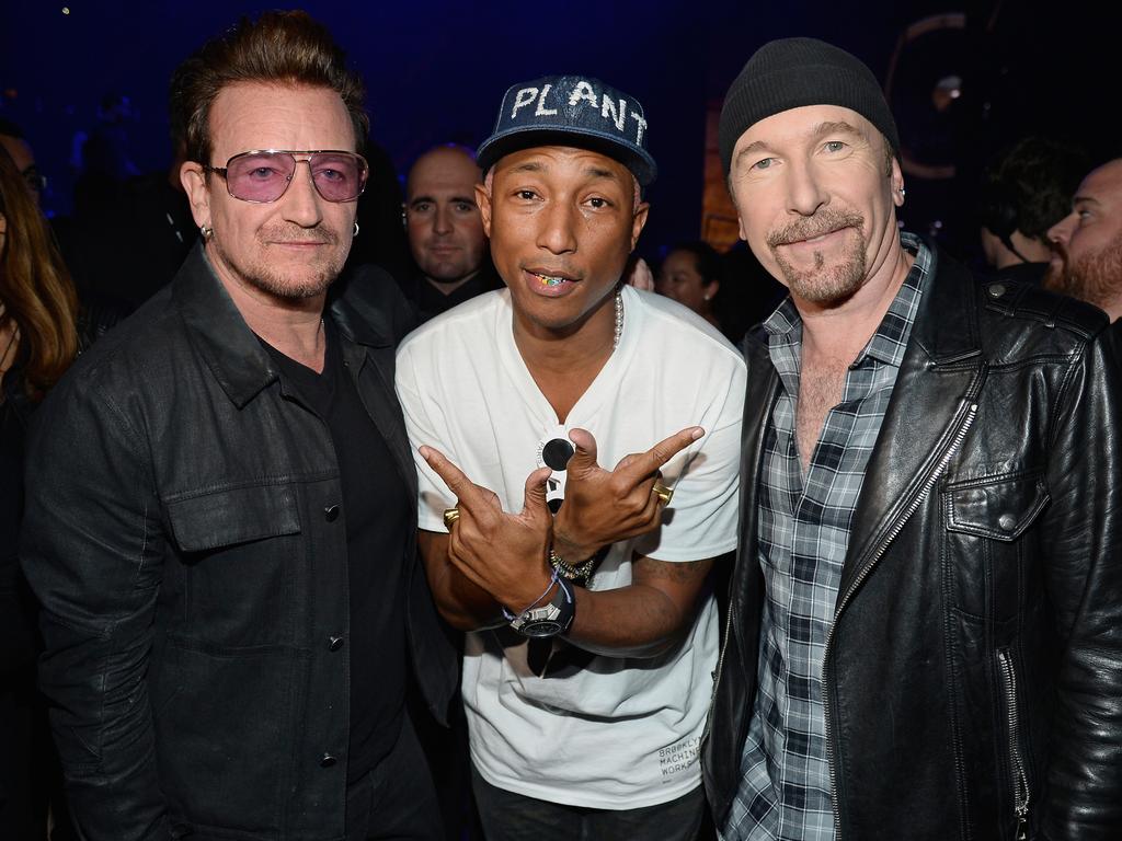 Bono, Pharrell Williams, and The Edge backstage at the iHeartRadio Music Awards. Picture: Getty