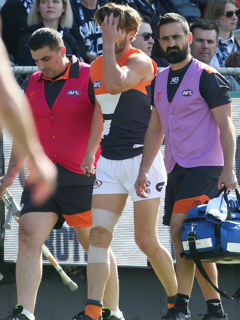 Ward walks to the rooms after injuring his knee. Picture: Michael Klein