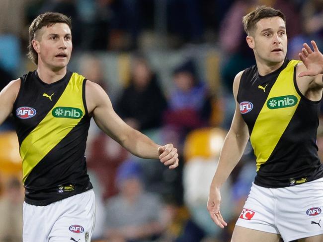 BRISBANE, AUSTRALIA - JUNE 29: Liam Baker of the Tigers celebrates a goal during the 2023 AFL Round 16 match between the Brisbane Lions and the Richmond Tigers at The Gabba on June 29, 2023 in Brisbane, Australia. (Photo by Russell Freeman/AFL Photos via Getty Images)