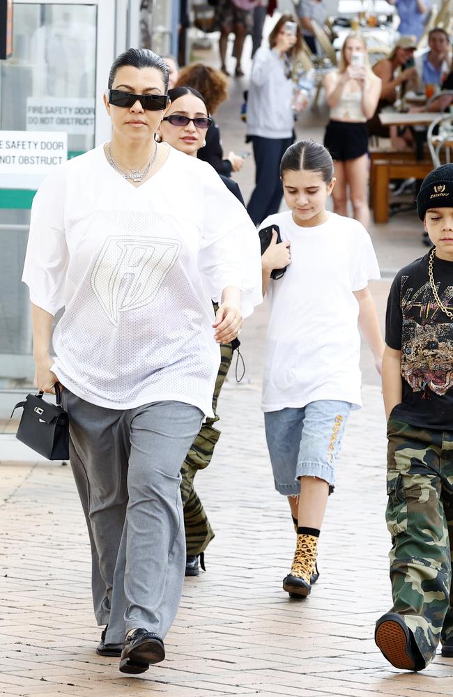 Kourtney Kardashian was spotted with two of her children in Coogee heading to a celebrity hotspot. Picture from Matrix.