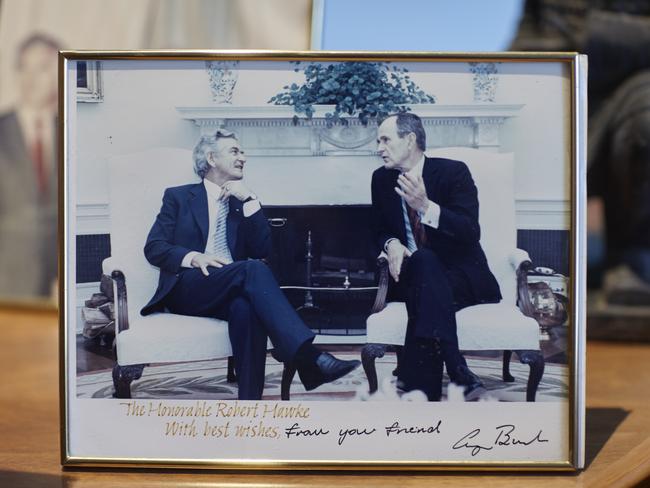 A photo on the wall of Bob Hawke and George H W Bush.