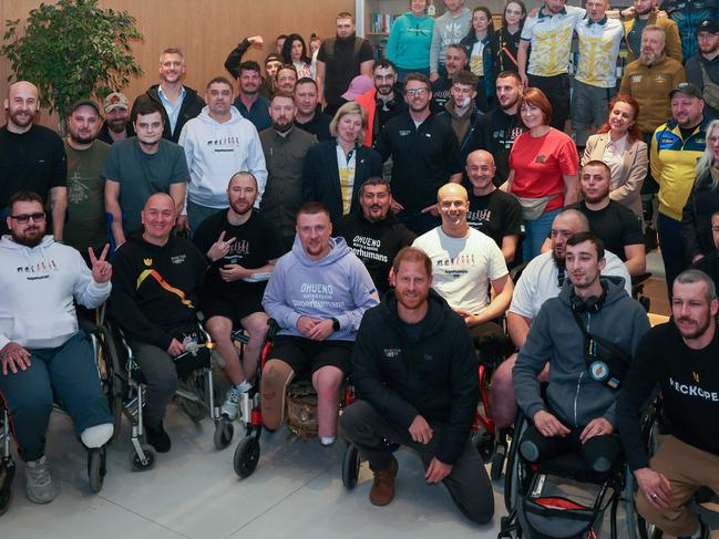 Prince Harry, Duke of Sussex (front row C) posing for a photograph during a visit to the Superhumans Centre in Lviv, Ukraine on April 10, 2025. Picture: AFP