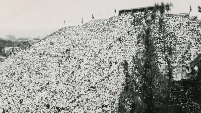 The huge crowd in the temporary stand at Memorial Drive in 1952. 