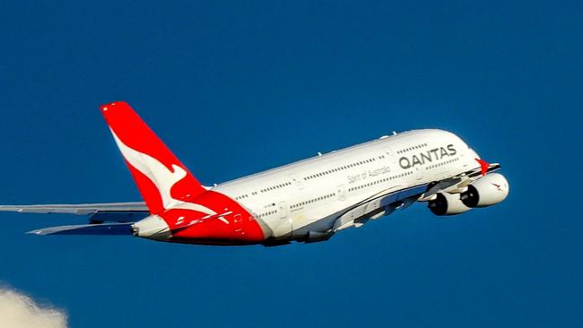 A Qantas Airbus A380-842, registration VH-OQK, has taken off to the west from Sydney Kingsford-Smith Airport and climbing above the clouds.  She is heading to Singapore as flight QF1.  This image was taken from Nigel Love Bridge off Airport Drive, Mascot on a sunny and windy afternoon on 8 April 2023.Escape 16 June 2024Why I TravelPhoto - iStock