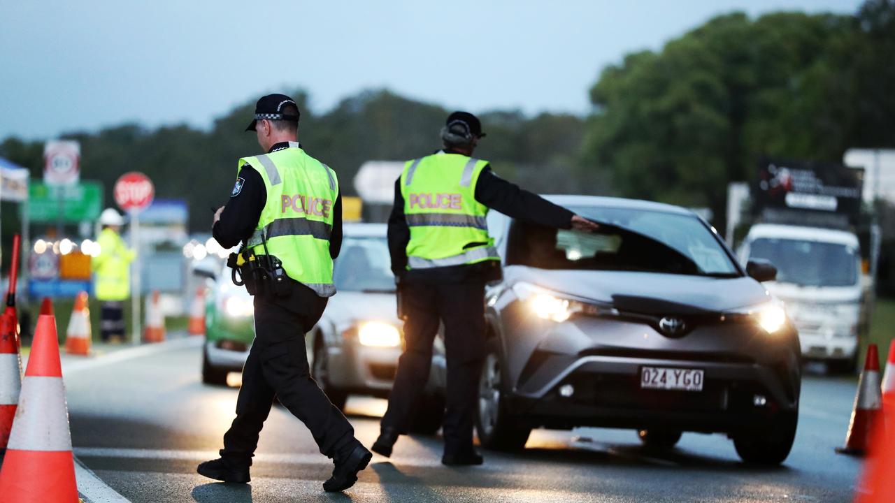 Two people who have allegedly tried to avoid coronavirus restrictions at the Queensland border have been caught riding in the back of a truck in Gympie. Picture: NIGEL HALLETT