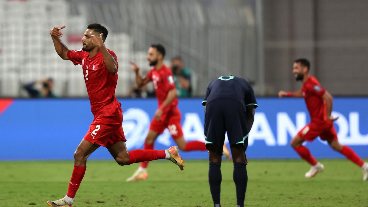 Amine Benaddi of Bahrain celebrates after teammate Mahdi Abduljabbar scores. Photo by Christopher Pike/Getty Images.