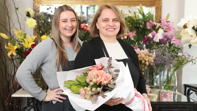 Flowers on Tedder owner Margot deGroot and employee Erika Inlis. Photo by Richard Gosling