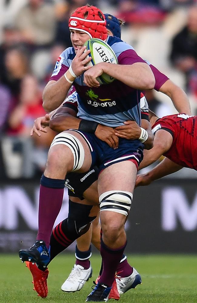 Harry Wilson is tackled by the Crusaders defence during a powerhouse display.