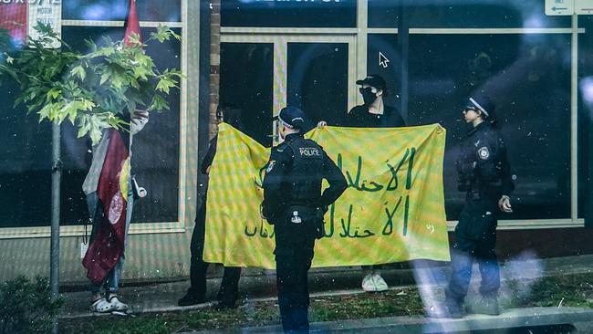 Protesters have unfurled banners reading “decolonise” and “empire built on genocide” and chanted “Aboriginal Land, Always Was, Always Will be.” Picture: NewsWire / Monique Harmer