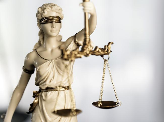 Legal office of lawyer. legal model statue of Themis goddess of justice.