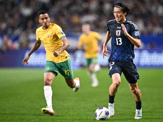 Japan's Keito Nakamura controls the ball during the FIFA World Cup 2026 Asian zone qualifiers football between Japan and Australia at Saitama Stadium in Saitama on October 15, 2024. (Photo by Philip FONG / AFP)