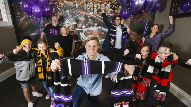 Former AFL Saints player Nick Riewoldt with parents Joe and Fiona, brother Alex, Chantel Defraga owner of the Swan Hotel and footy kids. Picture: David Caird