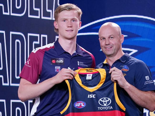 Matthew Nicks presents Fischer McAsey with his jumper in 2019. Picture: AAP Image/Michael Dodge