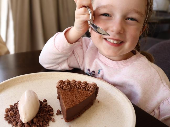 Evenfall’s silky-textured milk chocolate cremeux tart, paired with lemon myrtle cardamom ice cream and crystallised chocolate gets the seal of approval from the author's four-year-old niece. Picture: Stephanie Dalton