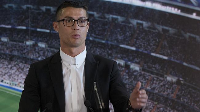 Real Madrid's Cristiano Ronaldo speaks after signing a new contract at the Santiago Bernabeu.