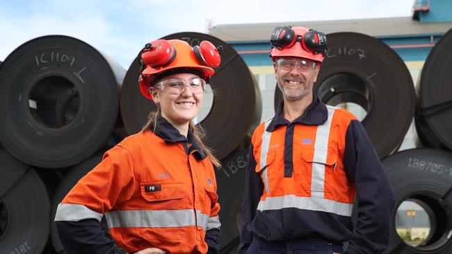 Bluescope Steel Electrical Maintenance Coordinator, Dean Boyton, 49 and his daughter Torah, 16, who is in the first year of her Electrical Apprenticeship with Bluescope Steel. Picture: David Swift.