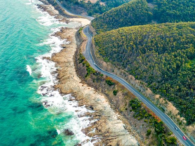 ESCAPE, CHEAT SHEET, GREAT OCEAN ROADPICTURE: ISTOCKCars driving on Great Ocean Road, Victoria, Australia  - aerial view