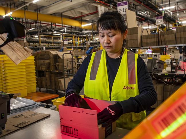 Associate Mai Phan pictured at the Amazon Fulfillment Centre BWU2, Kemps Creek.