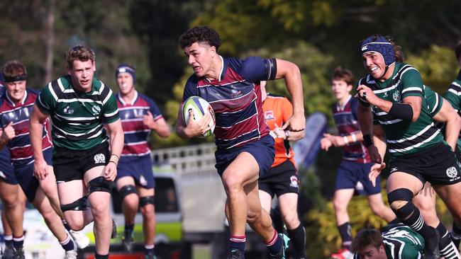 Jojo Fifita of TSS runs with the ball against BBC during their GPS Rugby clash. Photograph : Jason O'Brien