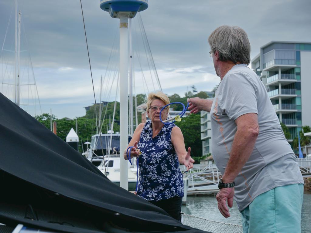 Townsville couple Corinne and Shane Baildon prepare their yacht for Tropical Cyclone Kirrily at Townsville's Breakwater Marina on Thursday morning. Picture: Blair Jackson