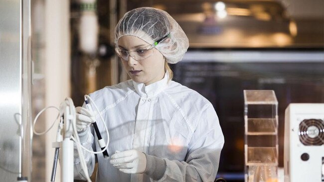 A lab worker inside a Moderna Inc facility in Norwood, Massachusetts. Picture: Adam Glanzman