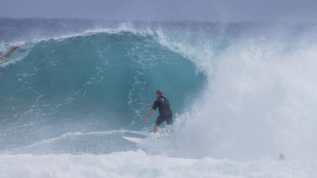 Surfers enjoying the larger swell at Snapper Rocks on Sunday 2 January 2022. Picture: Jerad Williams