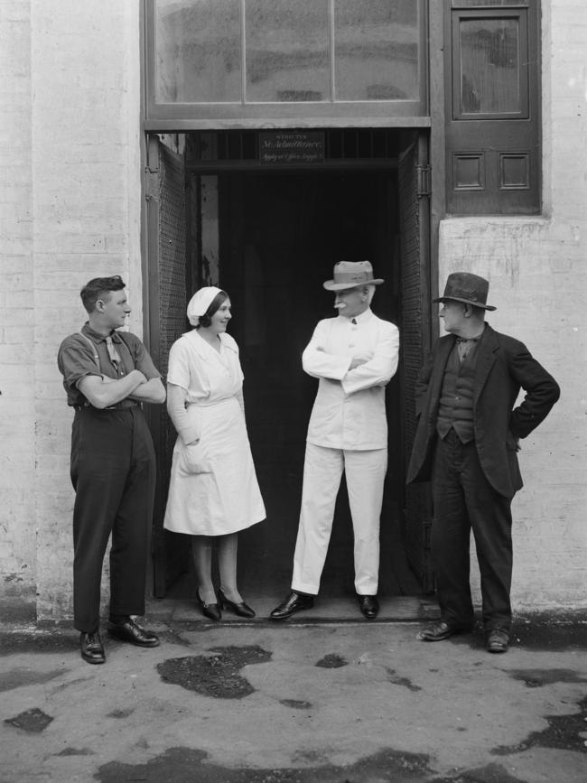 Macpherson Robertson being welcomed home by staff at his Fitzroy factory in 1935. Picture: State Library of Victoria