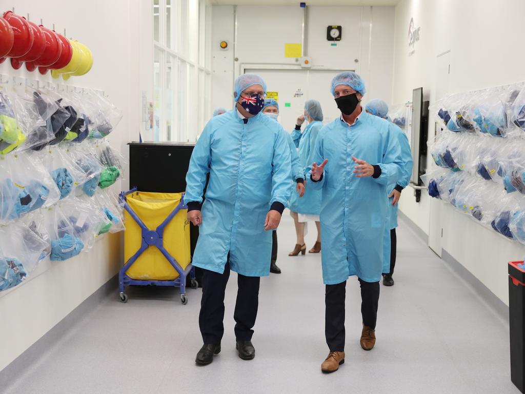 Prime Minister Scott Morrison and Health Minister Greg Hunt visit the CSL plant responsible for making and delivering the AstraZeneca COVID-19 vaccine in Melbourne. Picture: NCA NewsWire