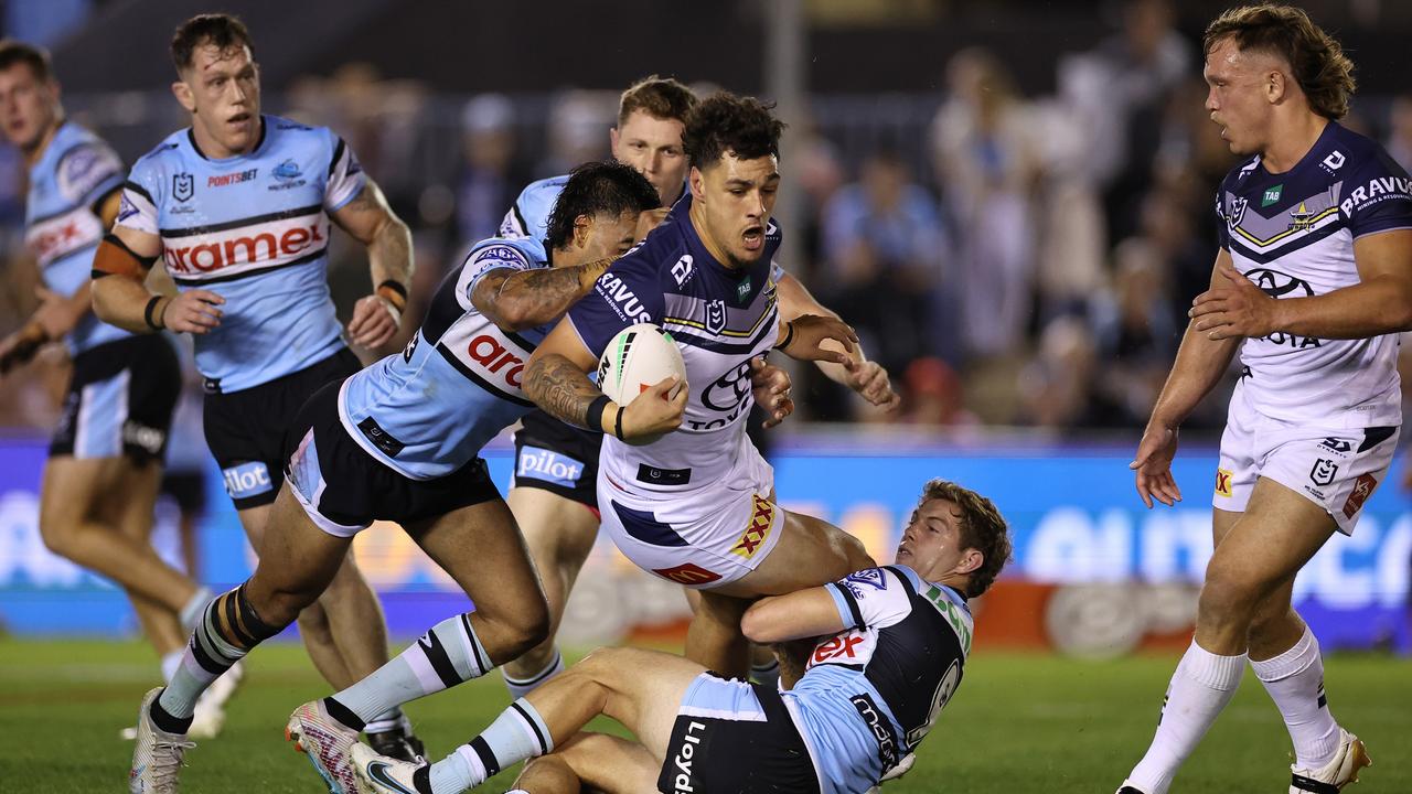 Jamayne Taunoa-Brown of the Cowboys is tackled during the round nine NRL match between Cronulla Sharks and North Queensland Cowboys at PointsBet Stadium on April 27, 2023 in Sydney, Australia. (Photo by Cameron Spencer/Getty Images)