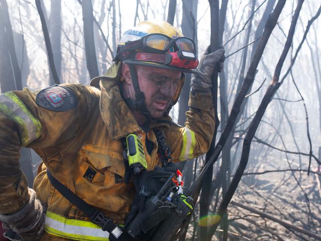 The Tasmanian Fire Service's Remote Area Team continue to control and contain bushfires on the state's West Coast. Picture: Warren Frey