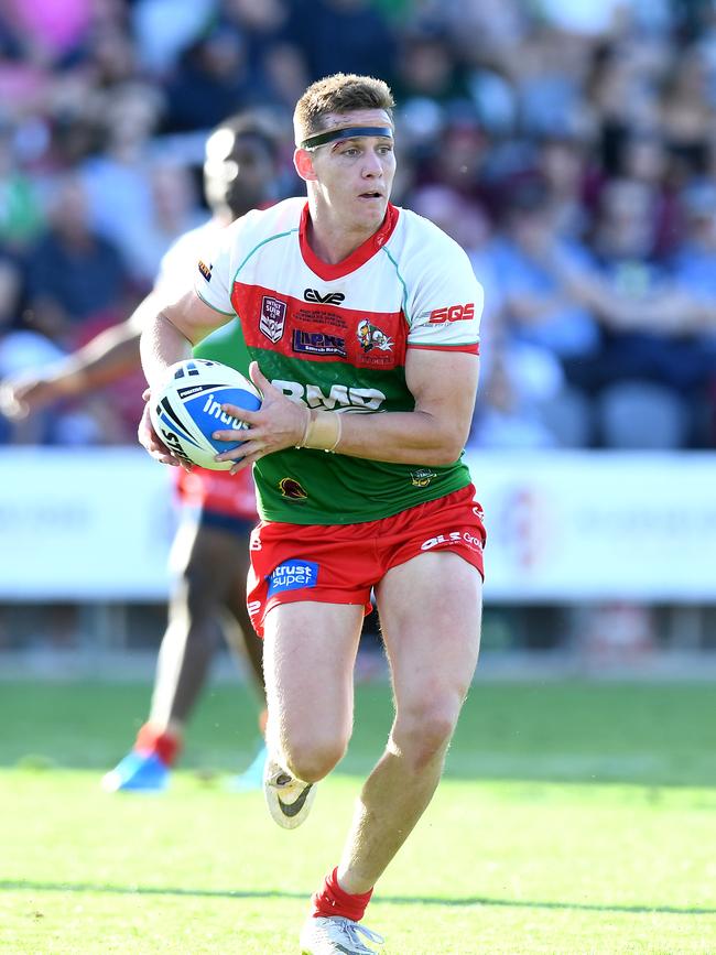 Mitch Cronin of the Seagulls runs with the ball during the Intrust Super Cup Grand Final against Burleigh Bears. (Photo by Bradley Kanaris/Getty Images)