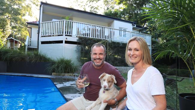 Sean Girvin and Katherine Burchfield, with dog Fleur, sold their home in Wahroonga, Sydney, in a matter of days. Picture: John Feder