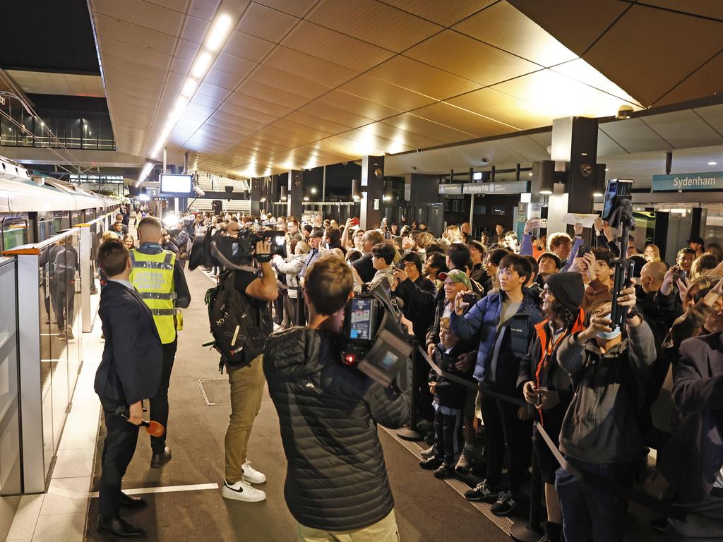 Pictured at Sydenham Station are the first passengers waiting to board the brand new Sydney Metro on its maiden run to Tallawong at 4.54am. Picture: Richard Dobson